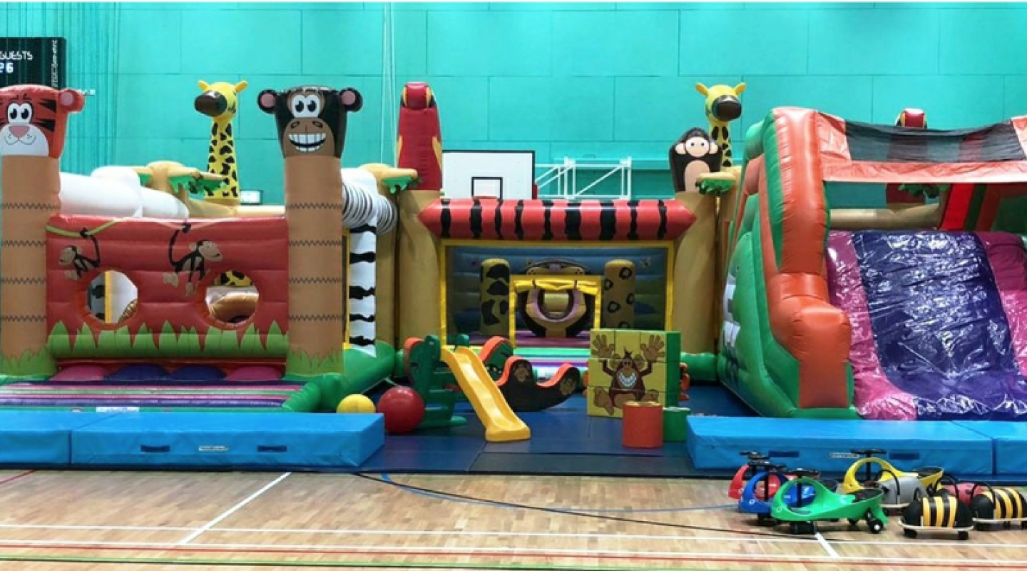 Inflatable play gym in a room